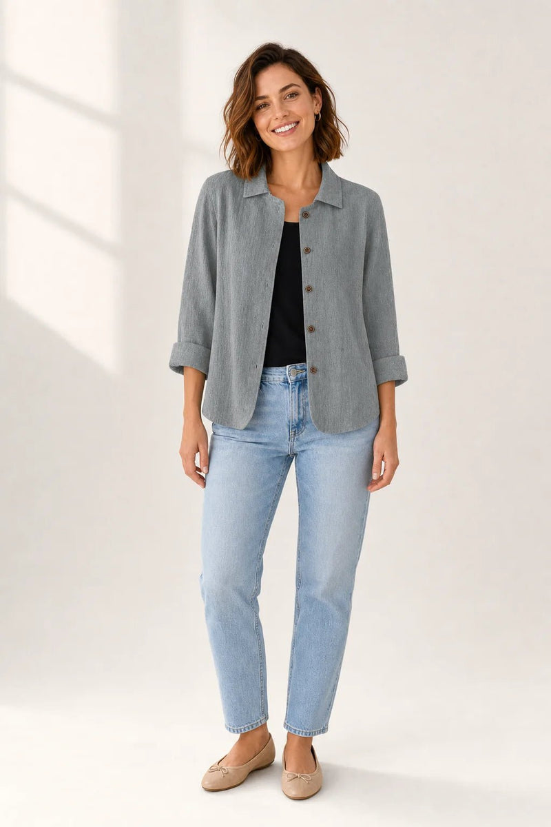 Sofaine Addison collared layering blouse in gray, worn open over a black top, styled full look