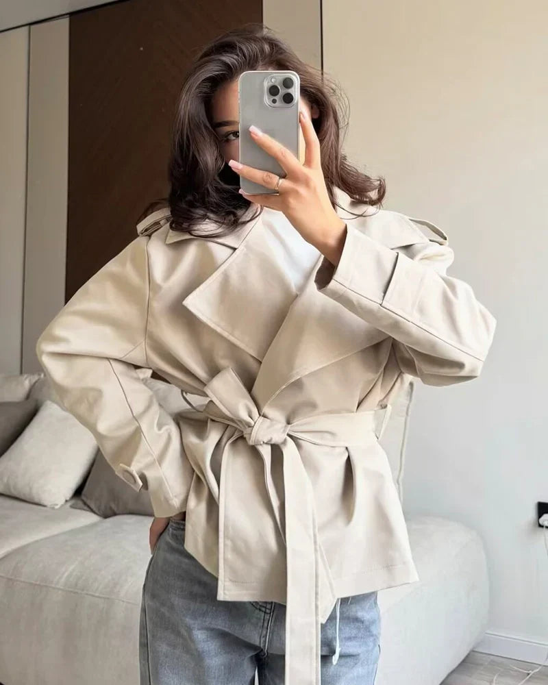 Oversized Short Trench Jacket for Women with Tie Belt and Wide Lapels in Beige, styled mirror view