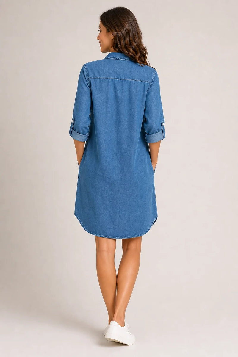 Sofaine Amelia denim shirt dress in medium blue wash, back view with rolled tab sleeves