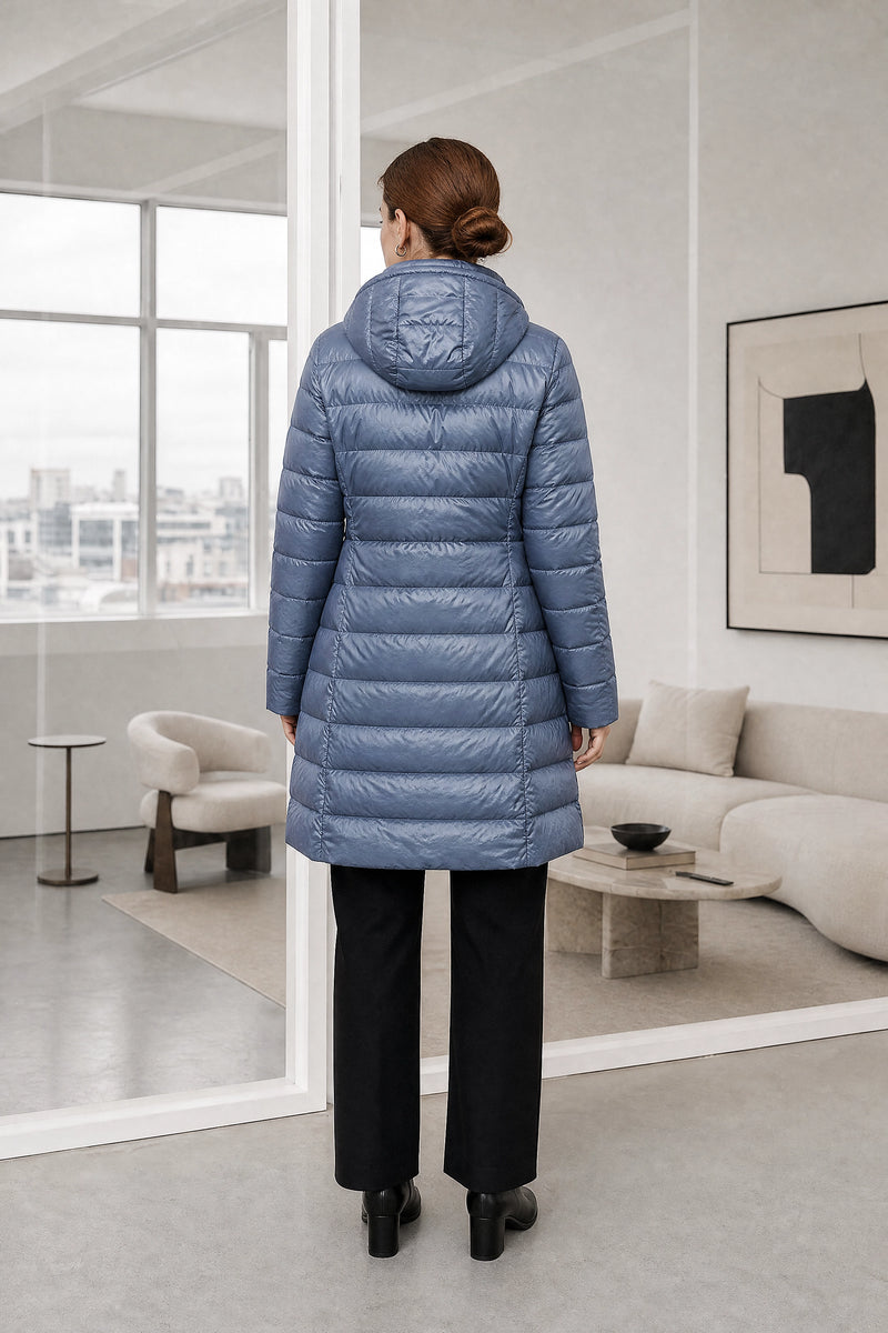 Anika | Hooded Down Jacket in Haze Blue, studio back view