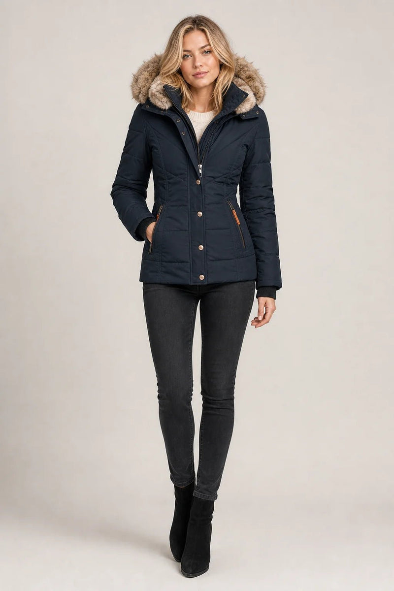 Sofaine Anna quilted winter jacket in navy blue with faux fur hood, worn front view