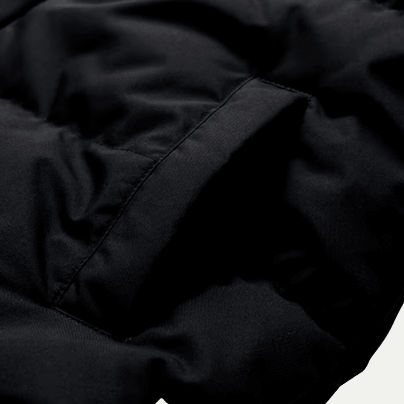 Oversized Hooded Puffer Jacket for Women with Contrast Hood and Piping in Black, pocket detail