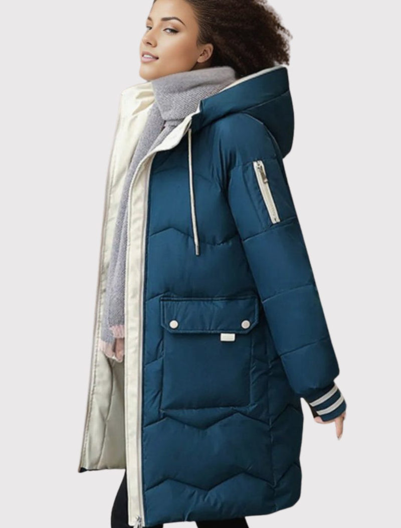 Mid Length Hooded Puffer Coat for Women with Flap Pockets and Knit Cuffs in Blue, side view