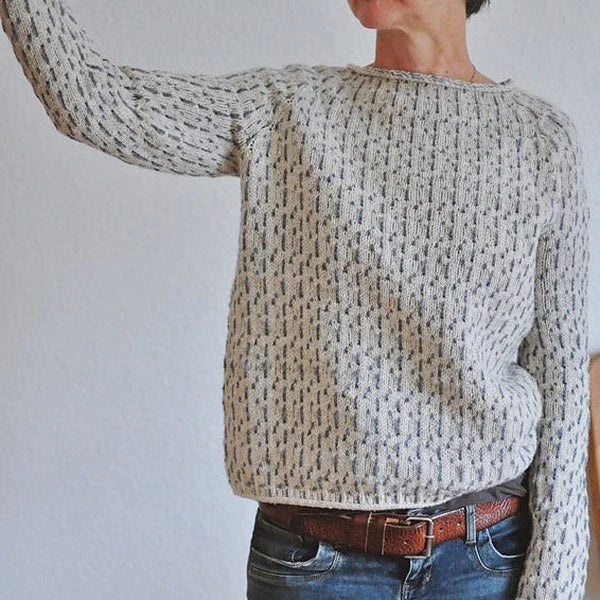 Patterned Knit Sweater for Women with Crew Neck and Raglan Sleeves, side view with raised arm