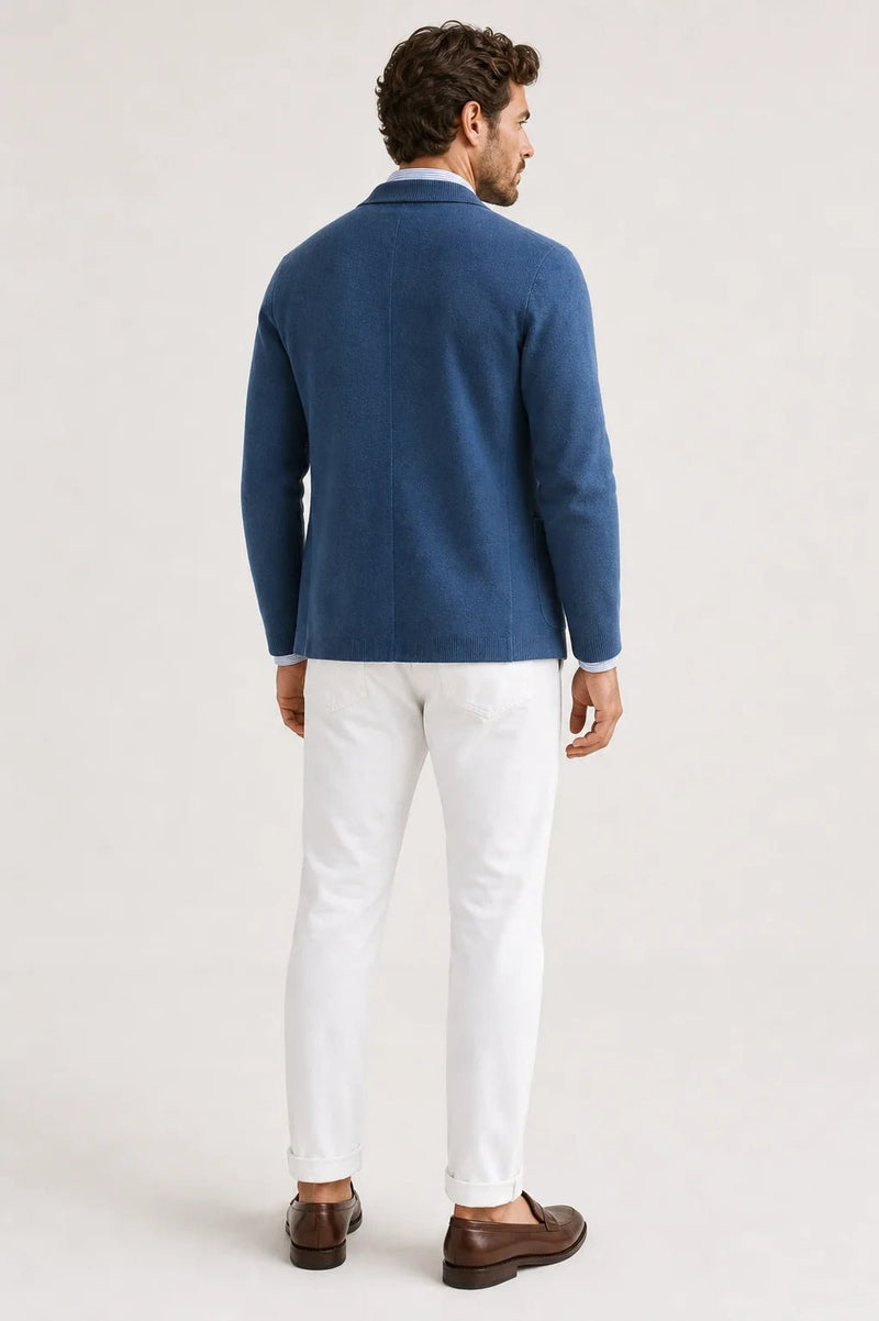 Sofaine Asher knit blazer in blue with white trousers, back view