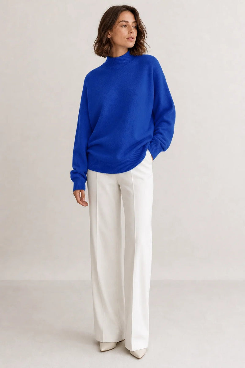 Sofaine Aubrey oversized mock-neck knit sweater in Blue, worn front