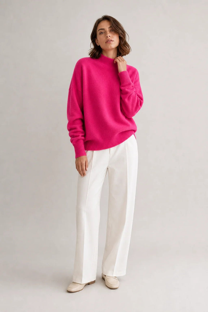 Sofaine Aubrey oversized mock-neck knit sweater in Pink, worn front