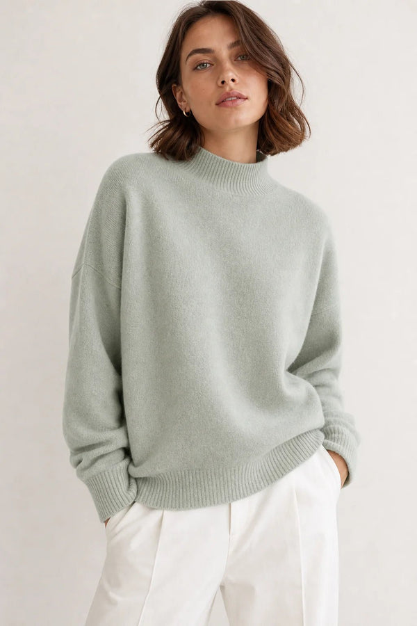 Sofaine Aubrey oversized mock-neck knit sweater in Light Green, worn front hero