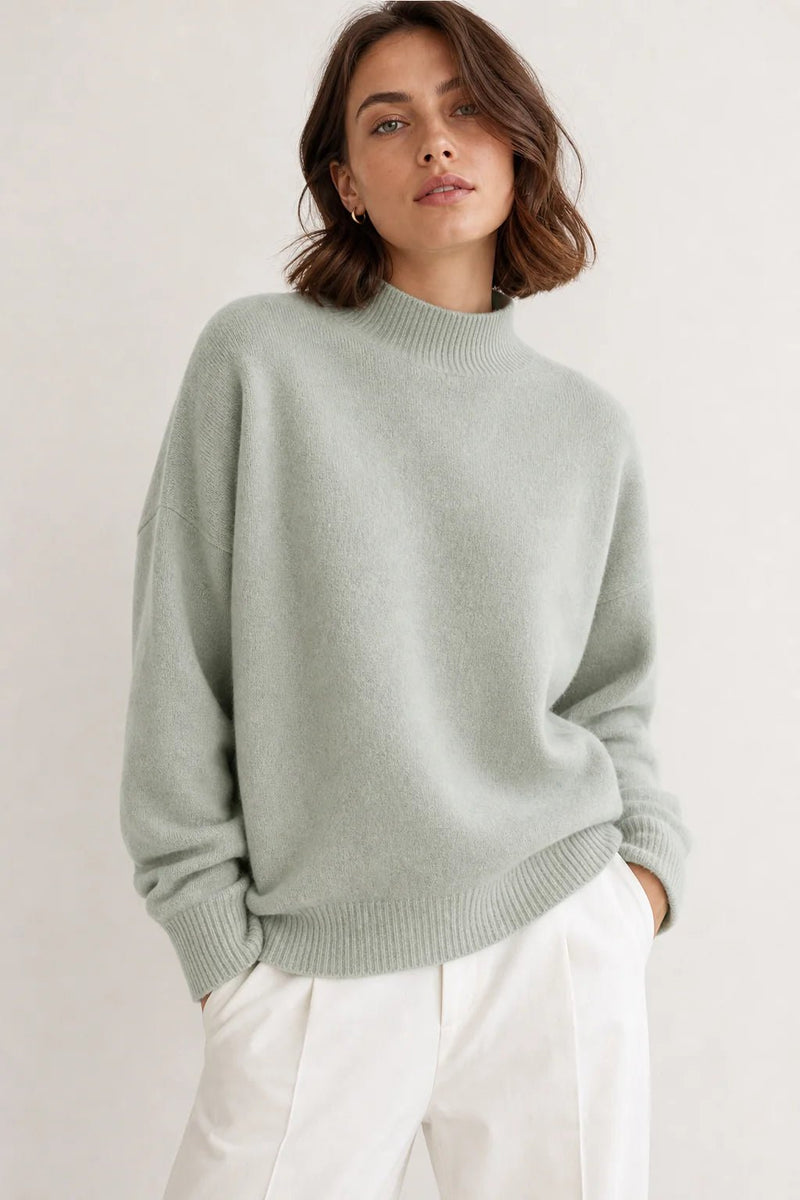Sofaine Aubrey oversized mock-neck knit sweater in Light Green, worn front hero