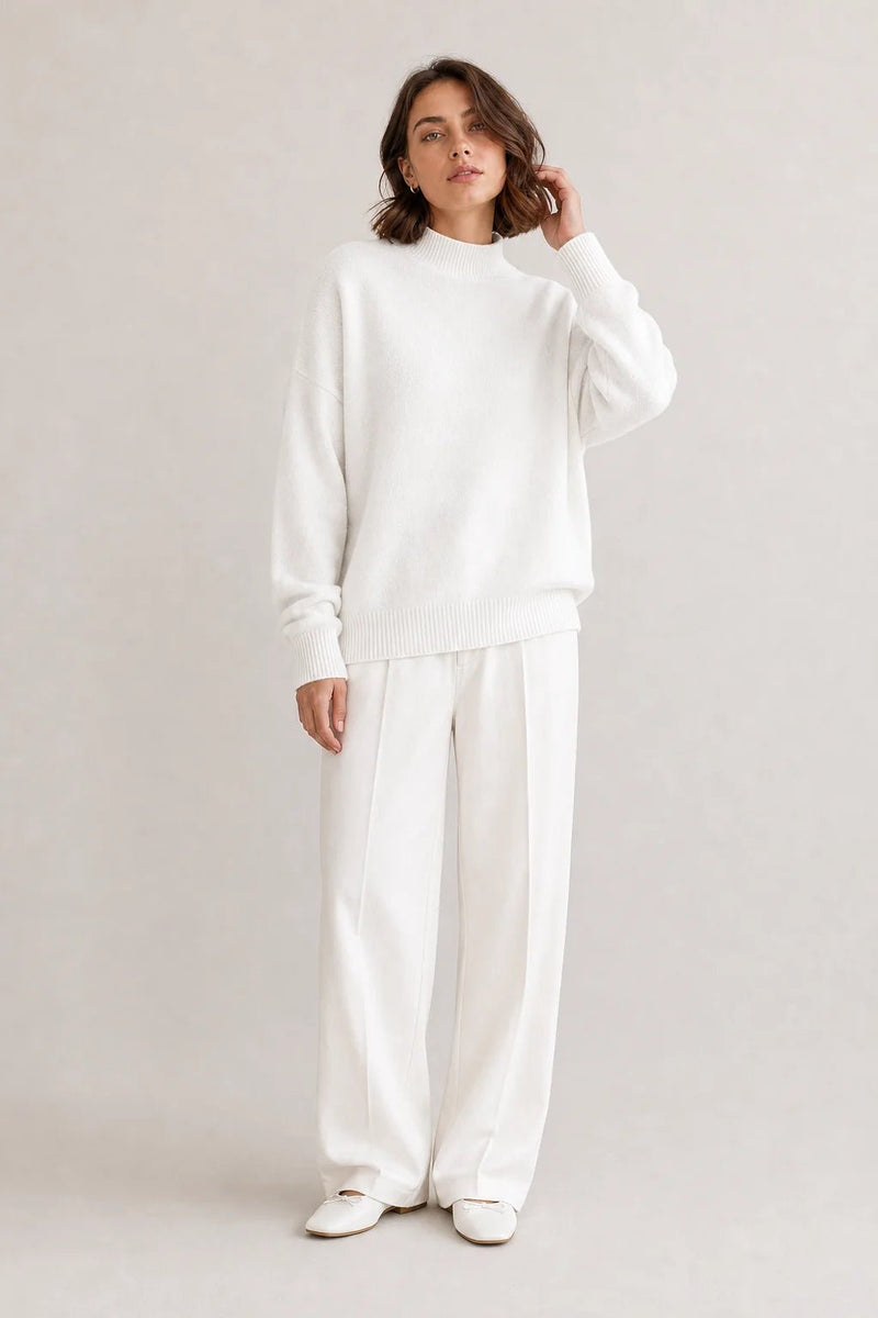 Sofaine Aubrey oversized mock-neck knit sweater in White, worn front