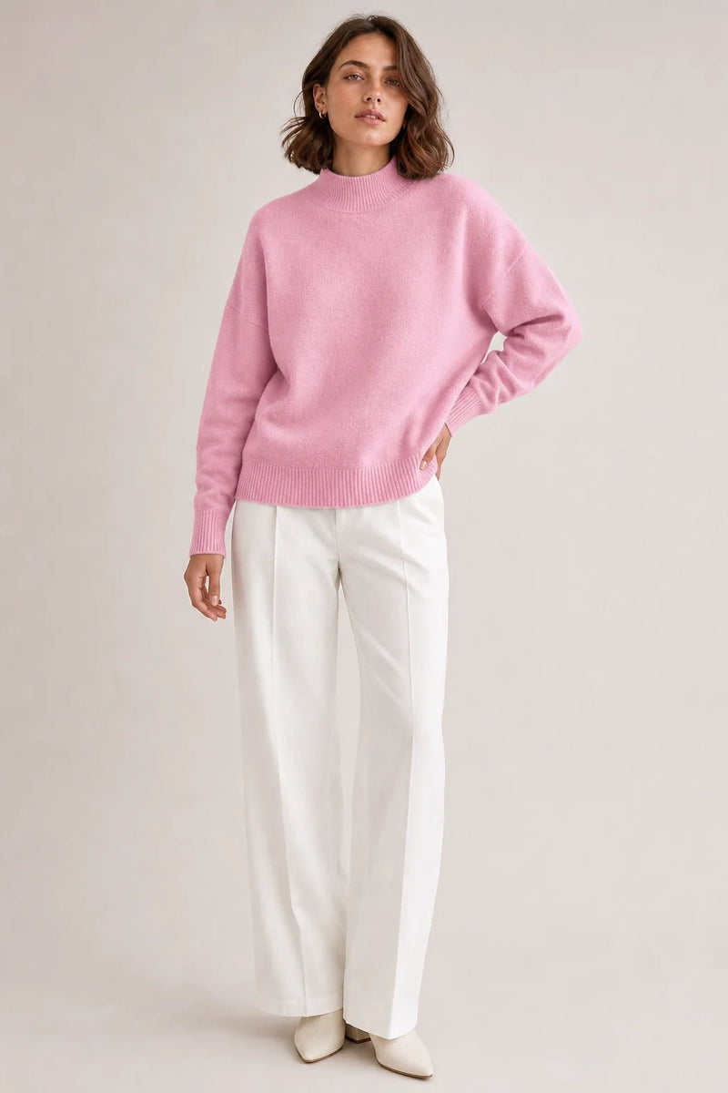 Sofaine Aubrey oversized mock-neck knit sweater in Light Pink, worn front