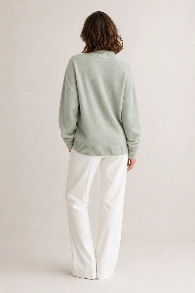 Sofaine Aubrey oversized mock-neck knit sweater in Light Green, worn back