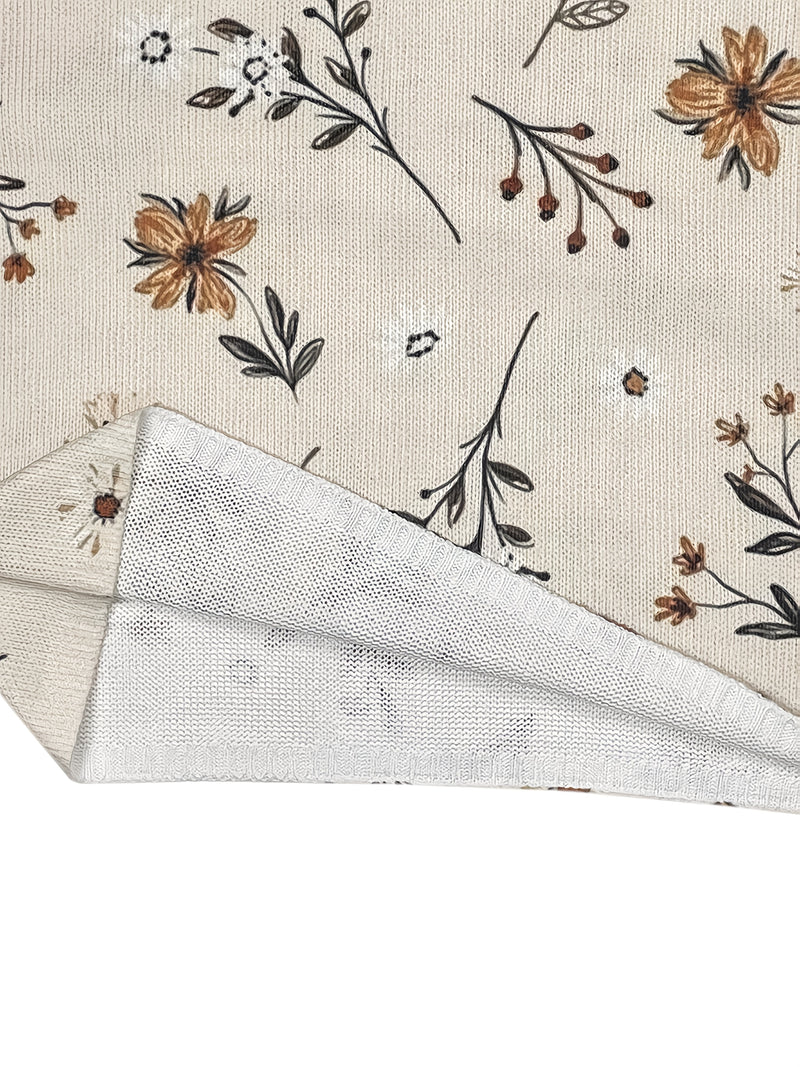 Floral V-Neck Sweater for Women with Wildflower Print and Ribbed Cuffs in Cream, fabric close-up