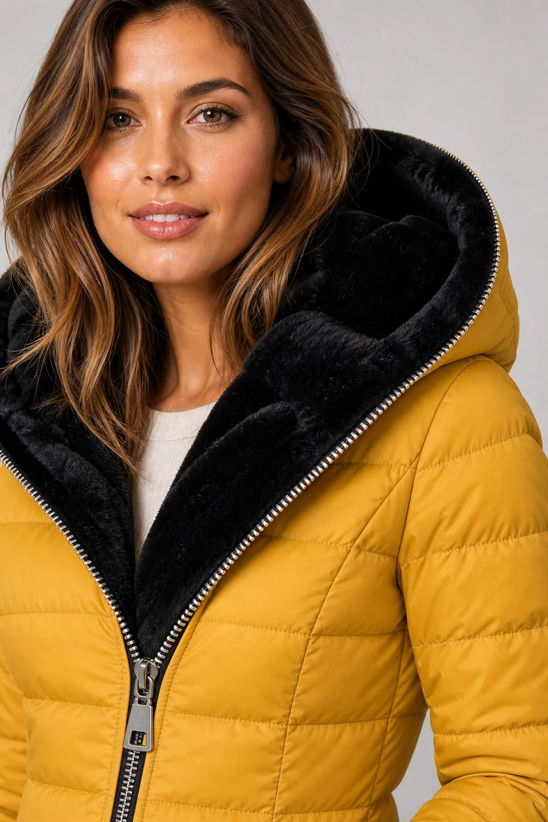 Sofaine Aurora mustard yellow quilted coat, close-up detail of black faux-fur lined hood and zip