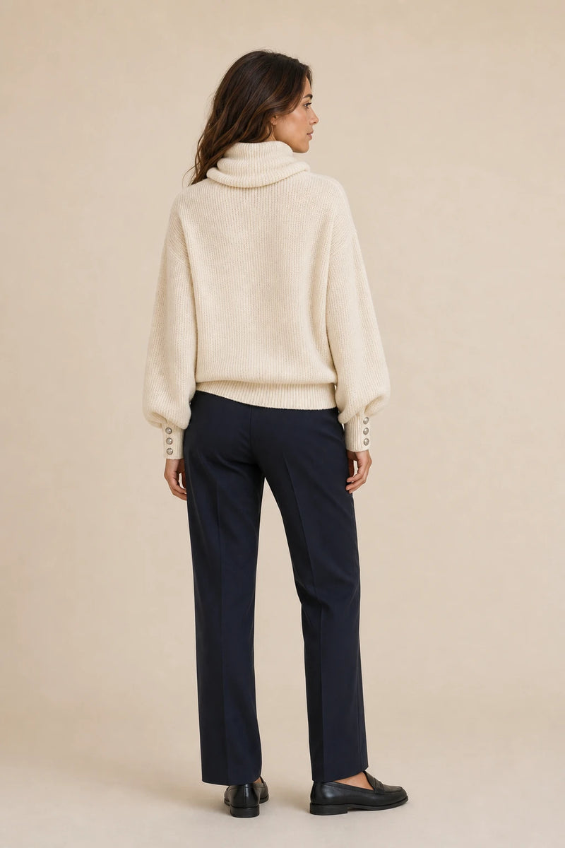 Ivory | Button-Cuff Turtleneck Sweater in Beige, studio back view
