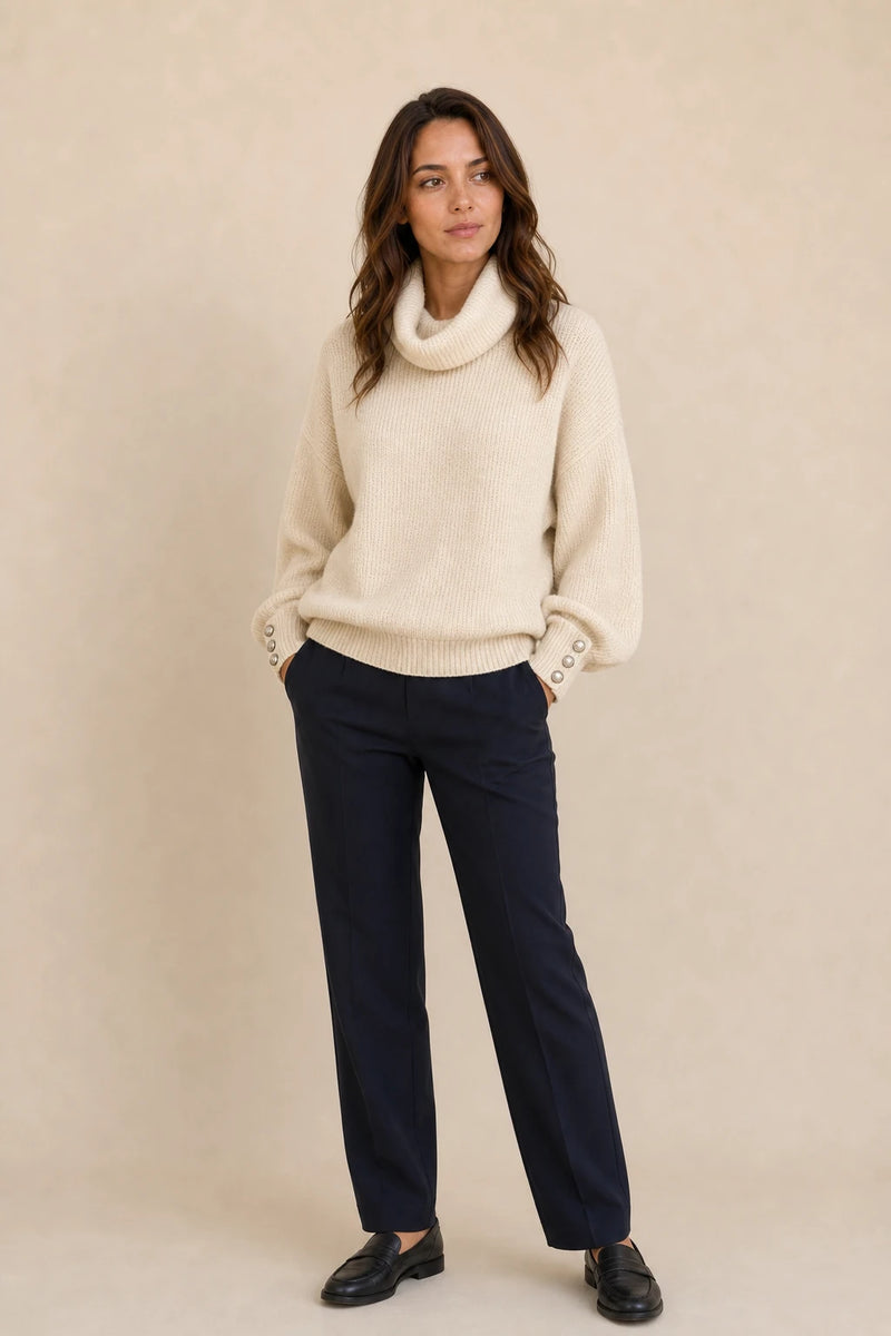 Ivory | Button-Cuff Turtleneck Sweater in Beige, studio front view