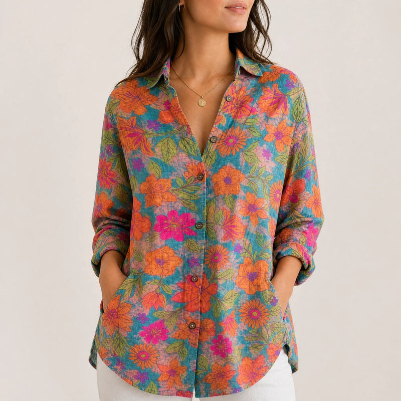 Sofaine Bella button-up blouse in teal with retro orange and pink floral print, worn front view