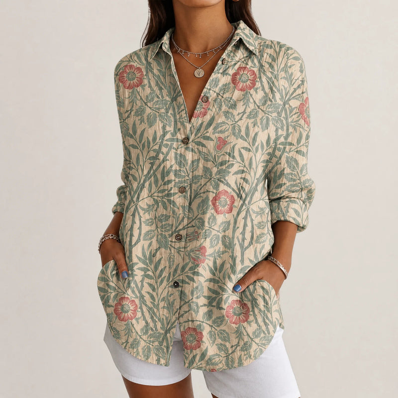Sofaine Bella button-up blouse in beige with sage leaf and red flower print, worn front view