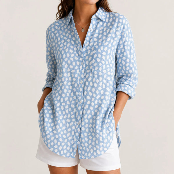 Sofaine Bella button-up blouse in light blue with white brushstroke dot print, worn front view