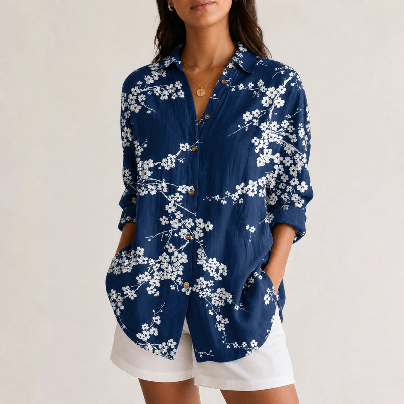 Sofaine Bella button-up blouse in navy blue with white blossom print, worn front view