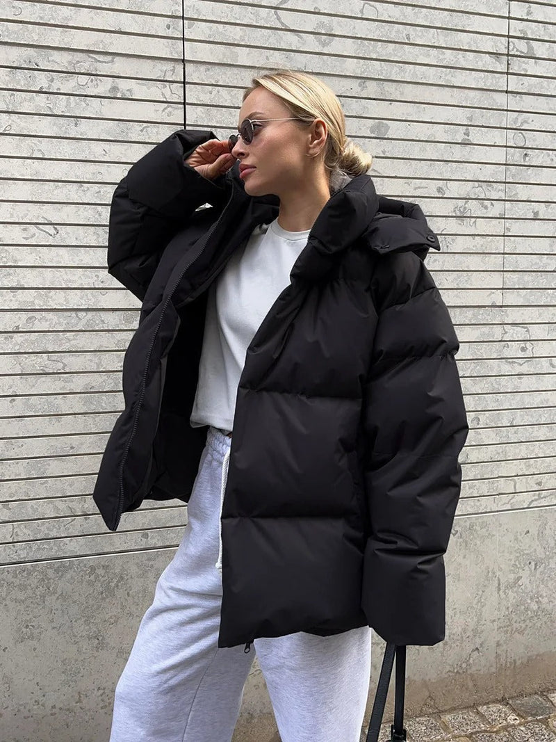 Oversized Hooded Puffer Jacket for Women with High Collar and Zip Front in Black, front view
