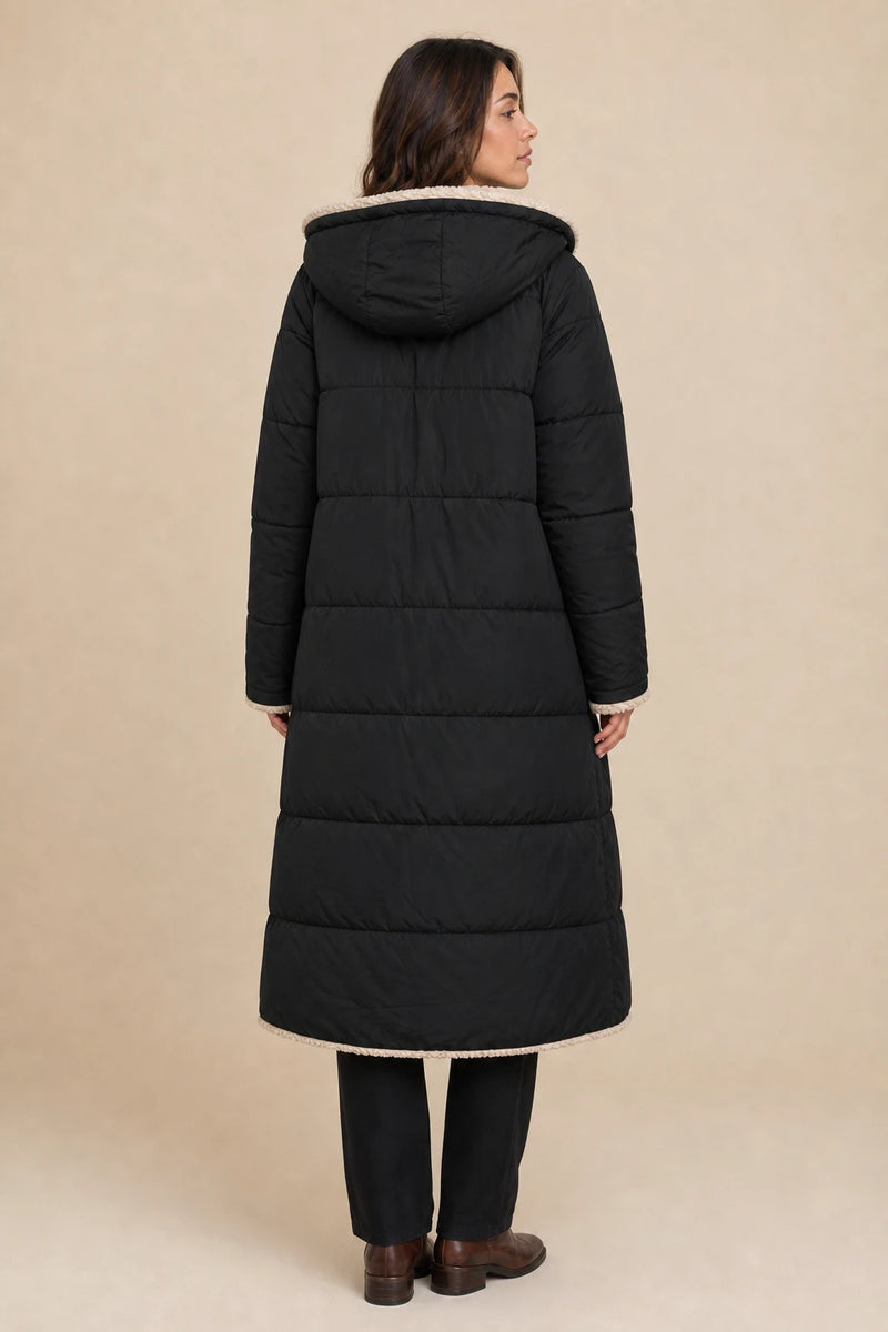 Celine | Hooded Puffer Coat in Black, studio back view