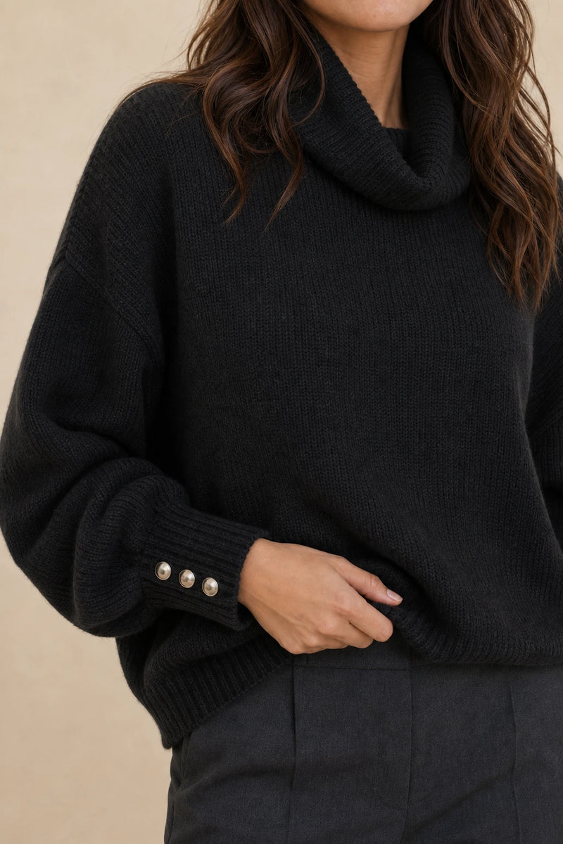 Ivory | Button-Cuff Turtleneck Sweater in Black, fabric close-up