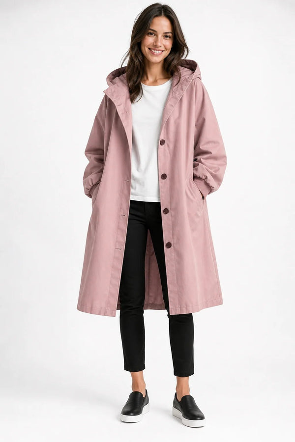 Sofaine Brooklyn long hooded windbreaker coat worn open over a white tee in dusty pink, front view