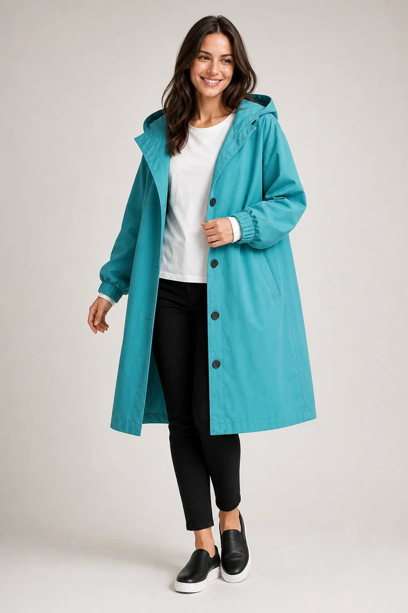 Sofaine Brooklyn long hooded windbreaker coat in teal blue, worn front view