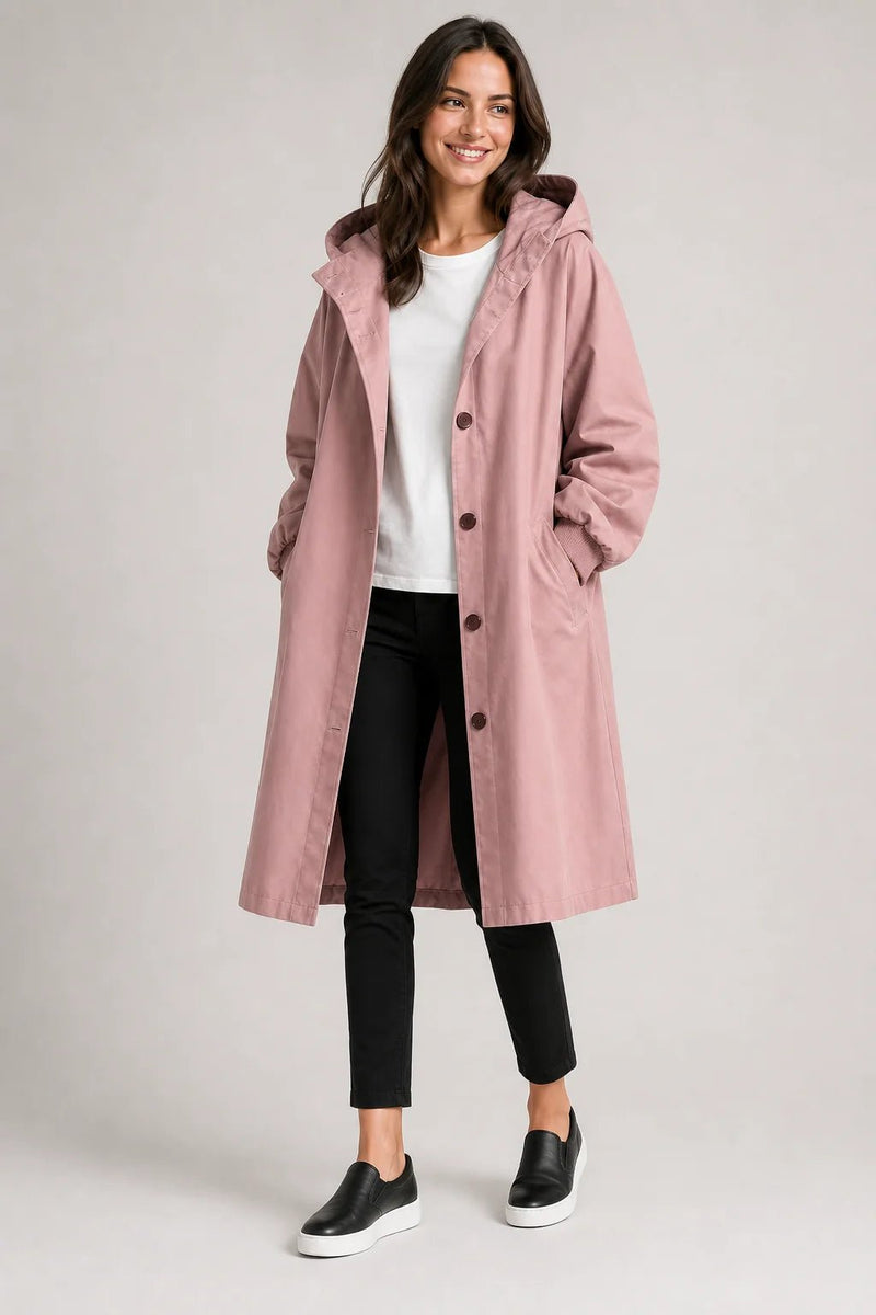 Sofaine Brooklyn hooded windbreaker coat in dusty pink, worn front view with hands in pockets