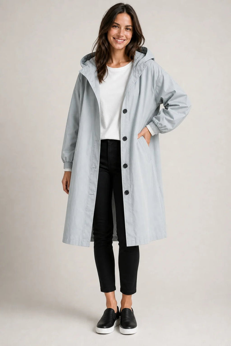 Sofaine Brooklyn long hooded windbreaker coat in light gray blue, worn front view