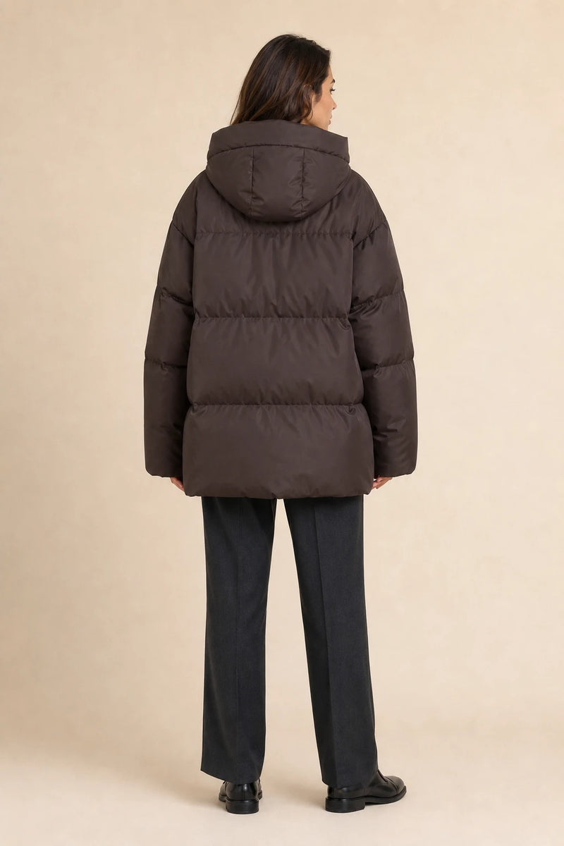 Tara | Oversized Puffer Jacket in Brown, studio back view