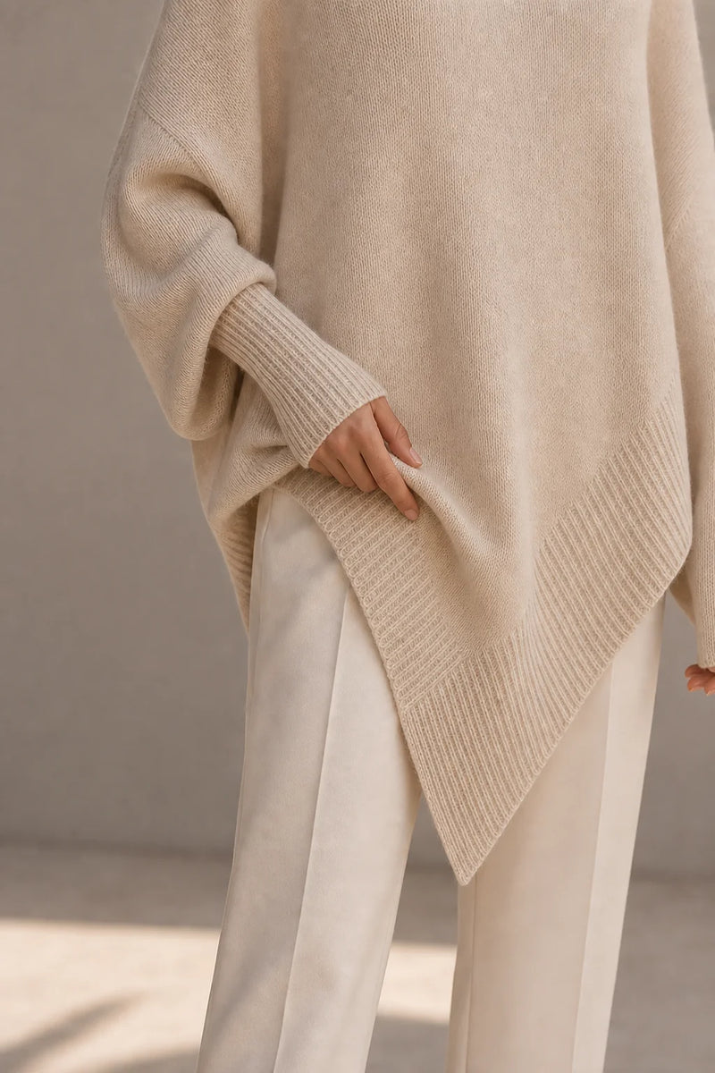 Sofaine Caroline women's oversized asymmetric poncho knit sweater in Beige, ribbed cuff and asymmetric hem detail