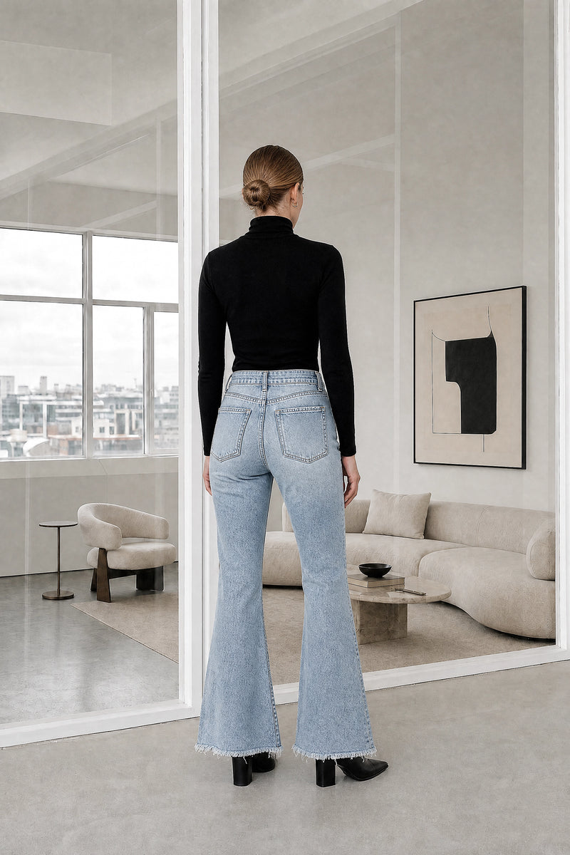 Camille | High-Waist Ripped Jeans in LightBlue, studio back view