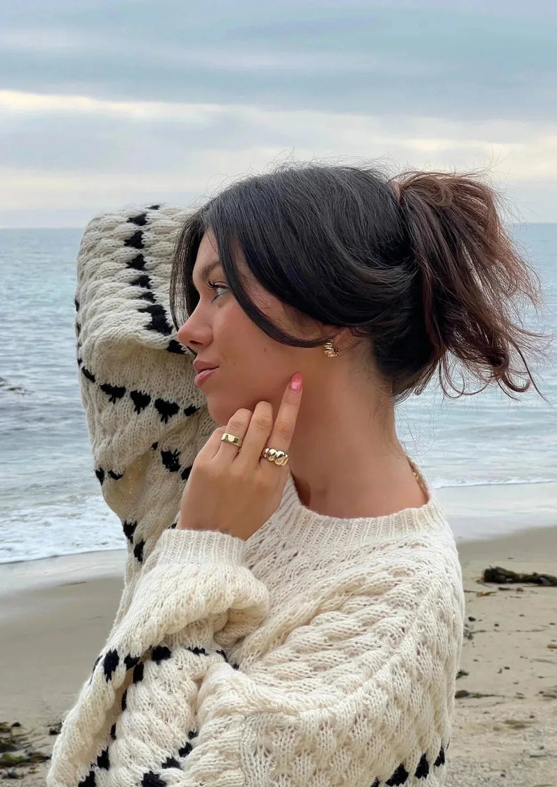 Chunky Knit Sweater for Women with Heart Pattern and Balloon Sleeves in Cream, styled side view