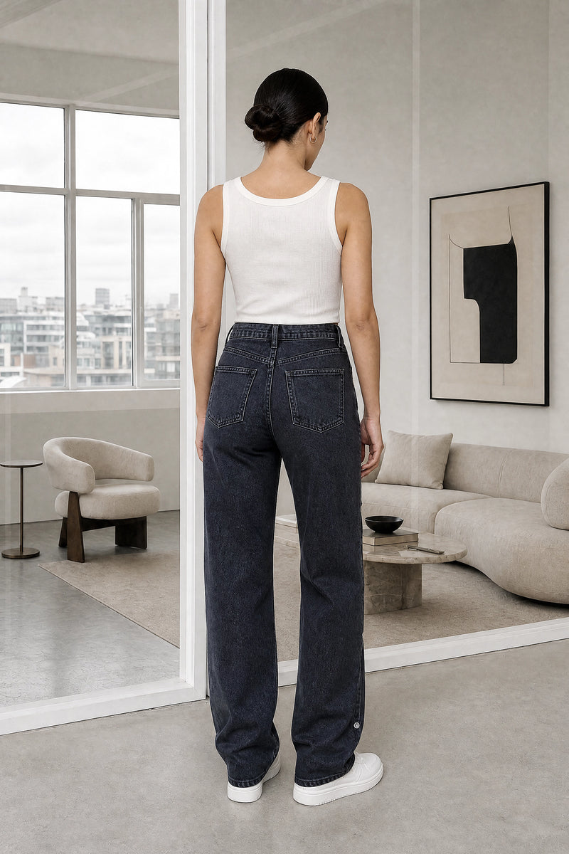 Cassandra | Ripped Boyfriend Jeans in Black, studio back view