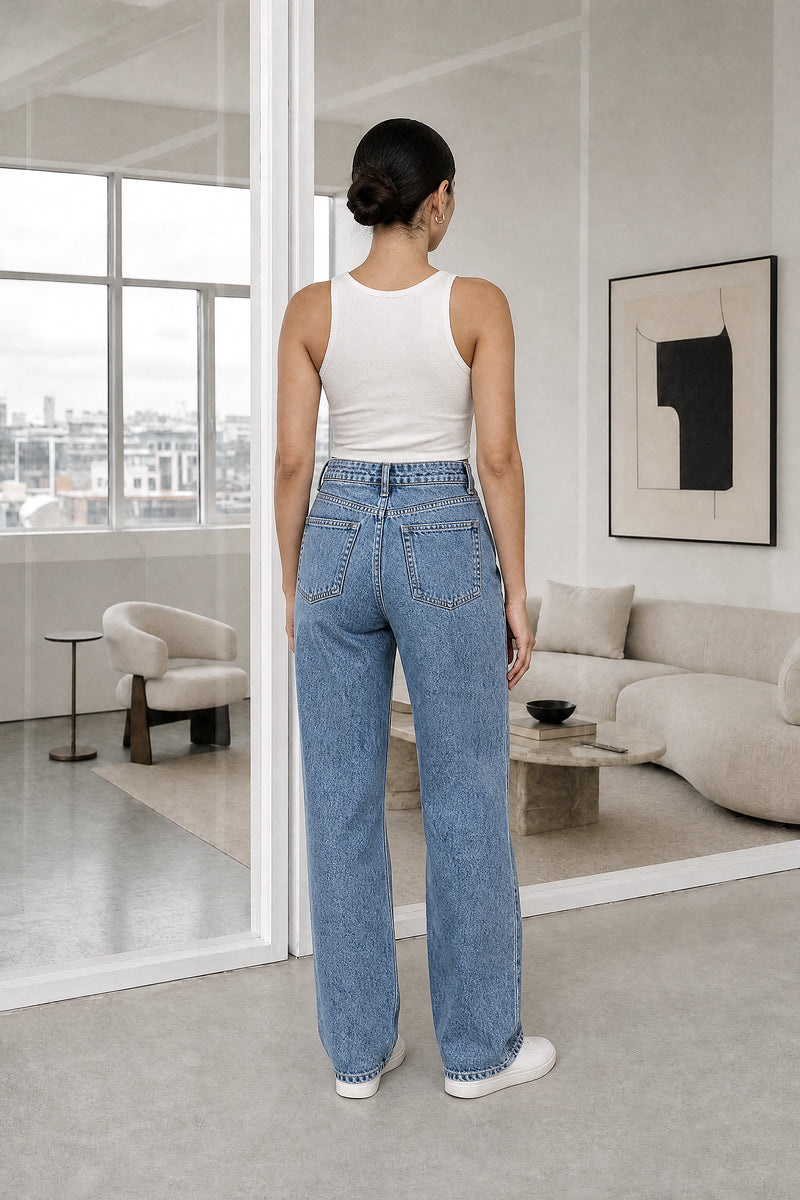 Cassandra | Ripped Boyfriend Jeans in Blue, studio back view