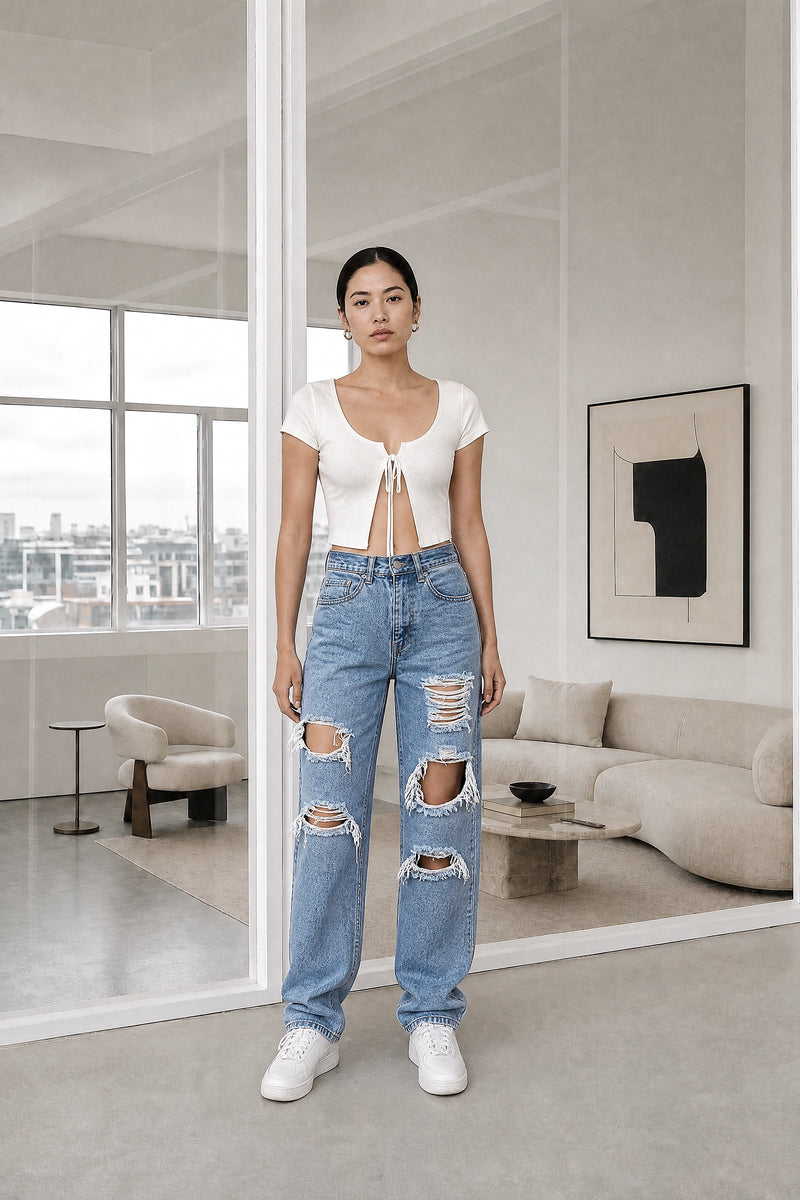 Cassandra | Ripped Boyfriend Jeans in Blue, studio front view
