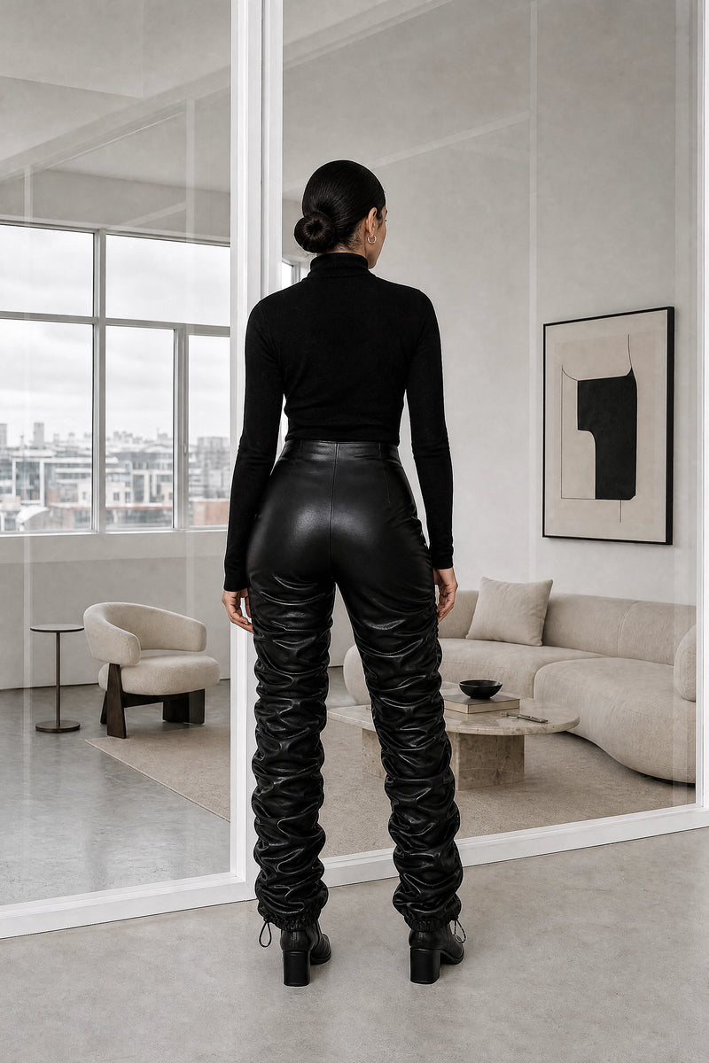 Celeste | Stacked Vegan Leather Pants in Black, studio back view