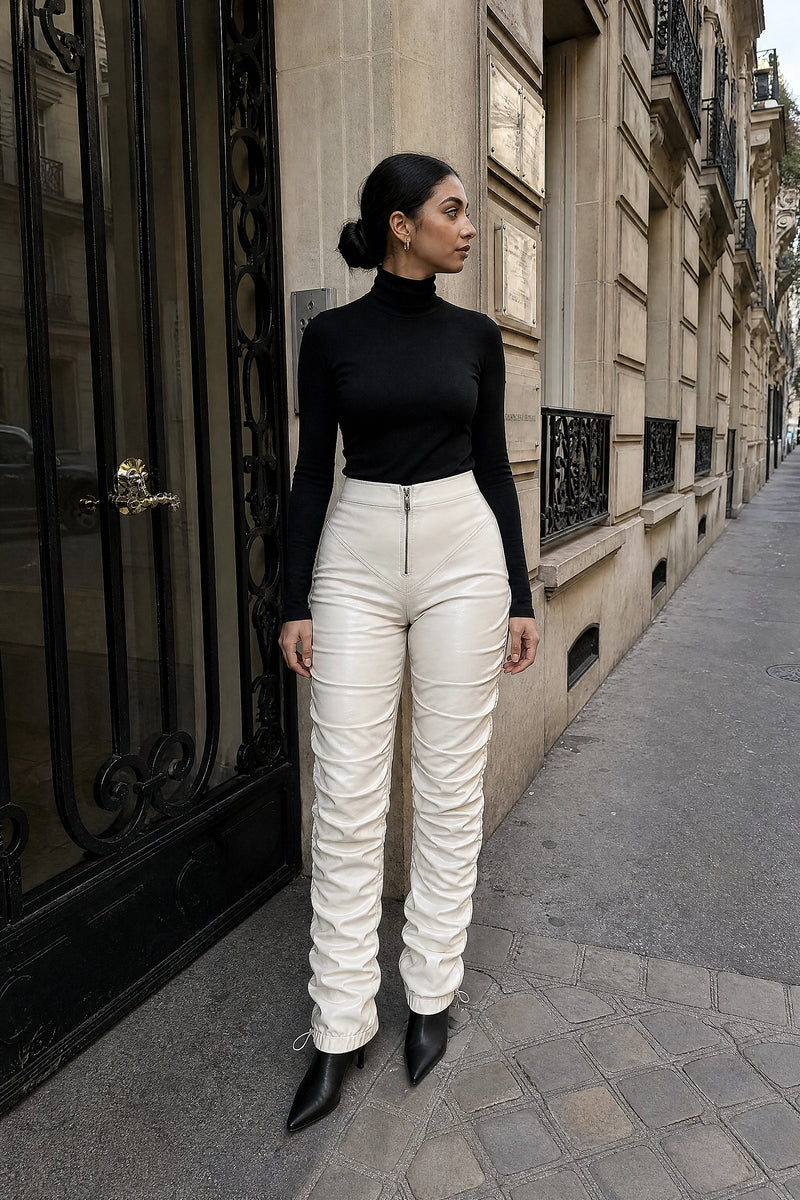 SOFAINE-V7-LIFE-Celeste | Stacked Vegan Leather Pants in Cream, street-style view