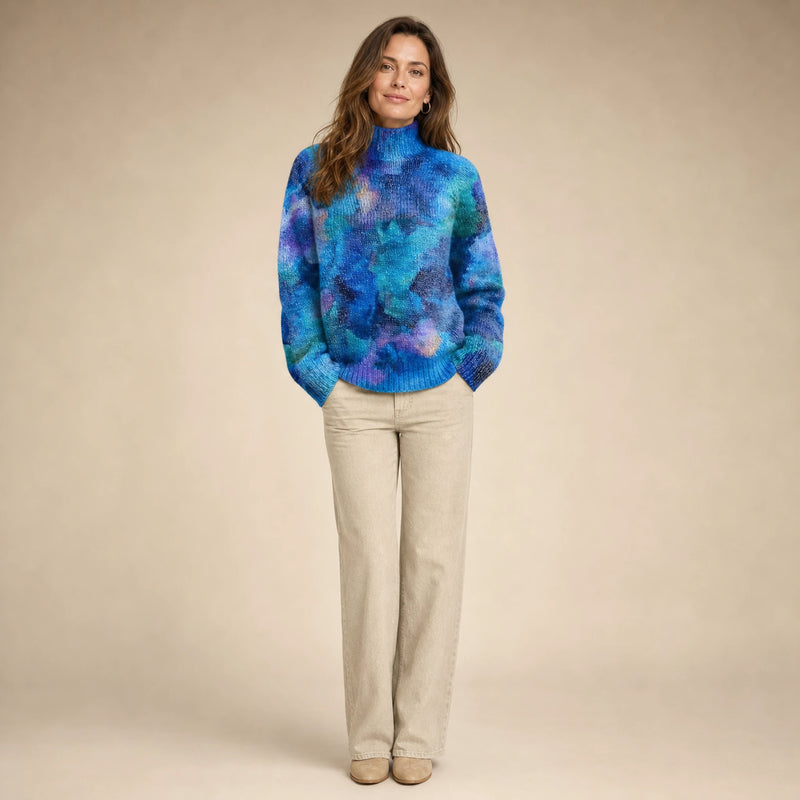 SOFAINE-V5-2026-07-07 Sofaine Claire soft-knit turtleneck sweater in Blue, worn front hero