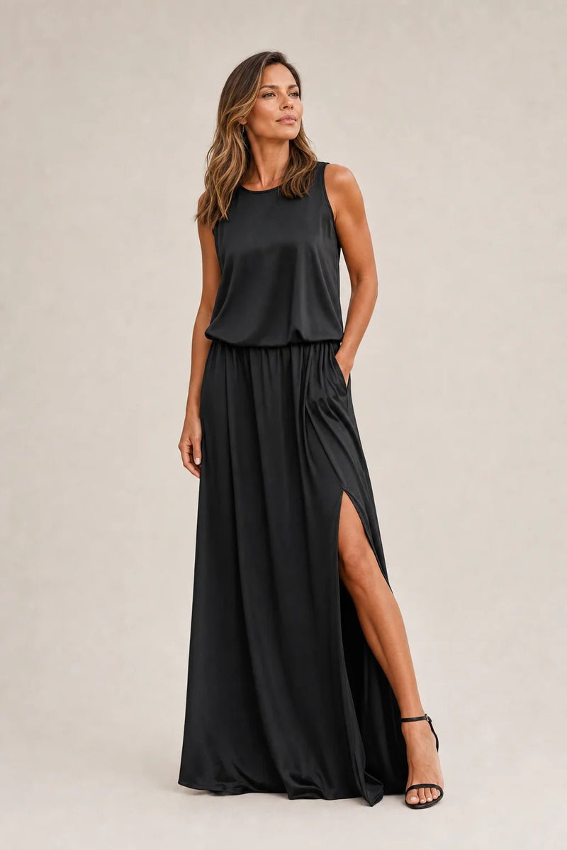 Sofaine Colette sleeveless round-neck maxi dress in black with side slit, worn front view