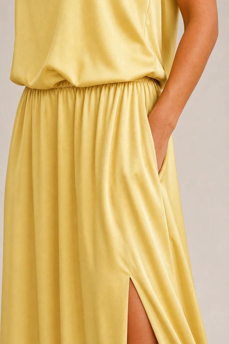 Sofaine Colette pale yellow maxi dress, close-up detail of gathered waist, pocket and slit