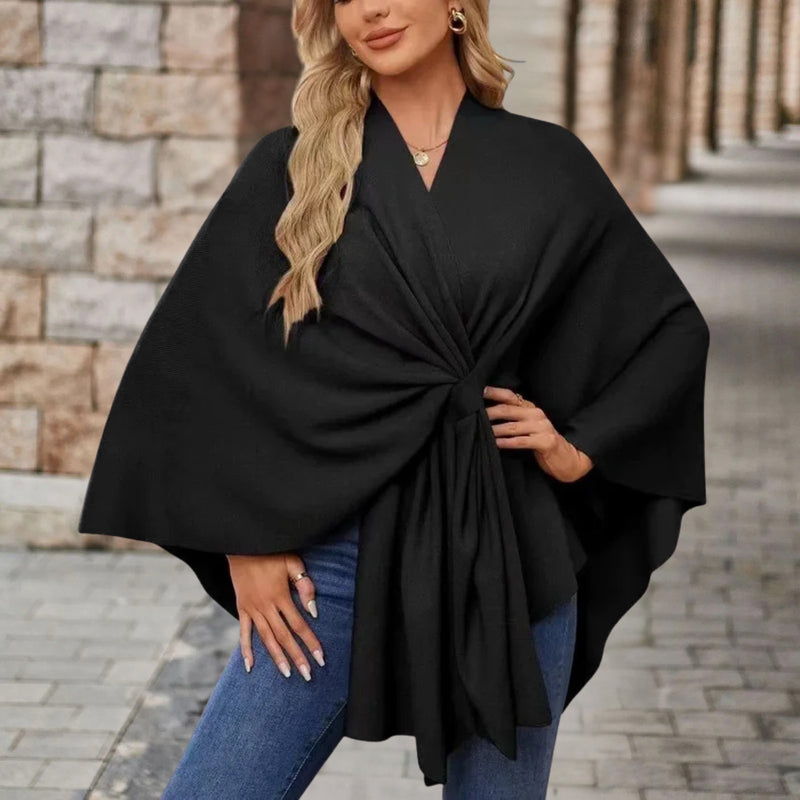 Knitted Poncho Cape for Women with Twist Front and Batwing Sleeves in Black, front view