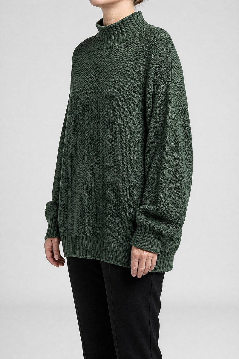Sofaine Elise waffle-knit mock neck oversized sweater in Green, side view studio shot