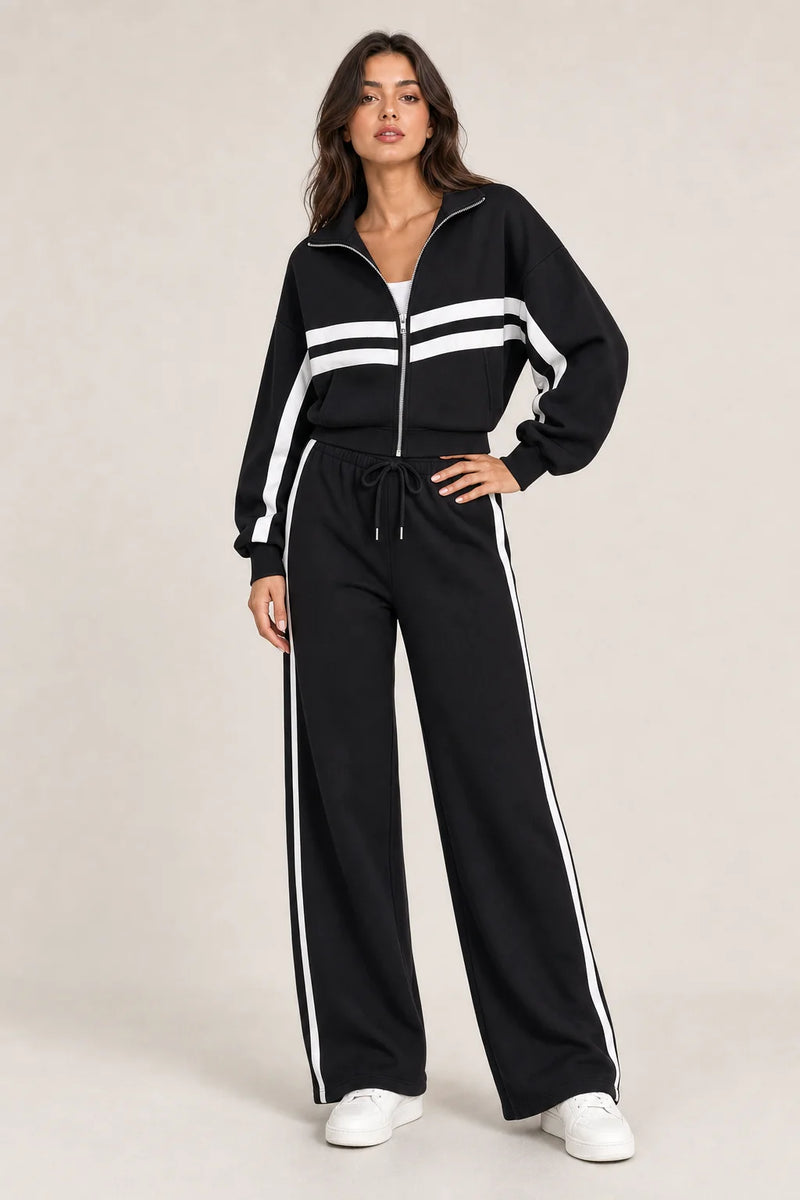 Sofaine Elizabeth zip jacket and pants two-piece set in Black, worn front