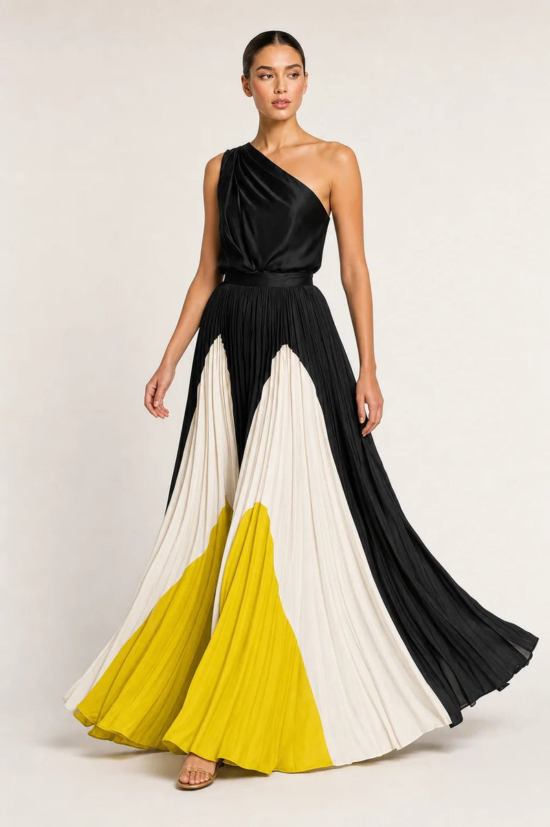 Sofaine Evelyn one-shoulder pleated maxi dress in black and yellow with flowing skirt, worn front view