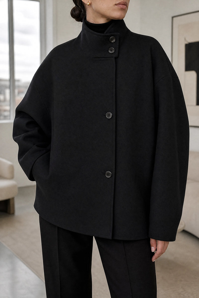 Fernanda | Stand-Up Collar Coat in Black, fabric close-up