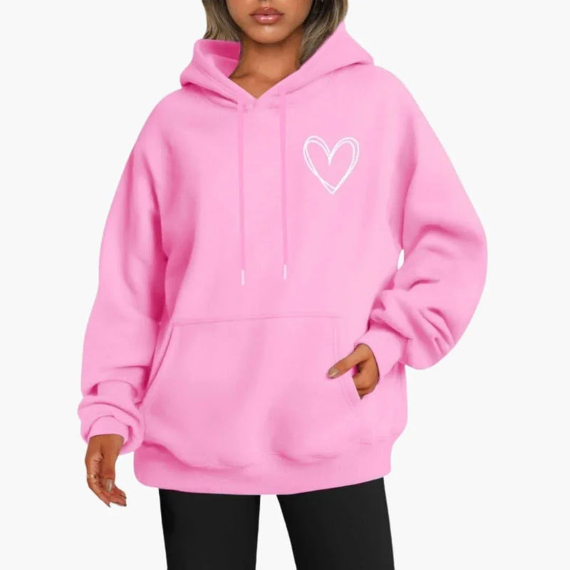 Fleece Heart Hoodie for Women with Oversized Fit and Kangaroo Pocket in Pink, front view