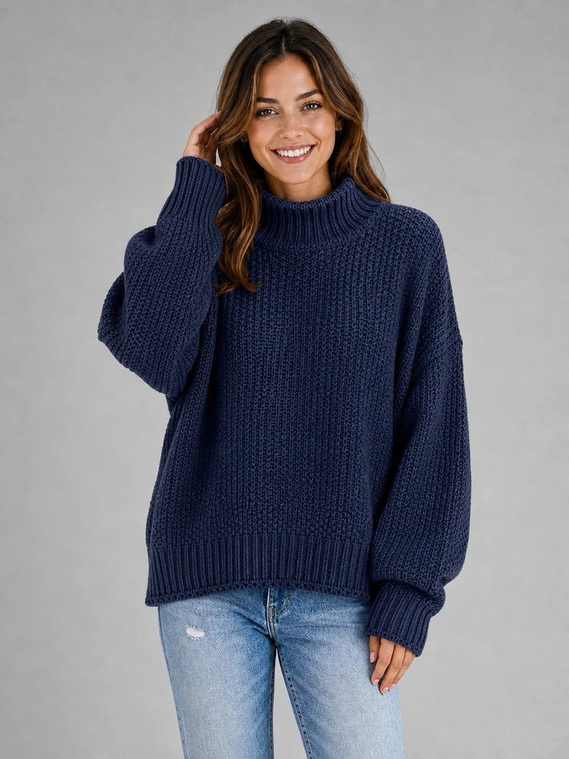 Sofaine Hazel oversized turtleneck knit pullover sweater in navy blue, worn front view